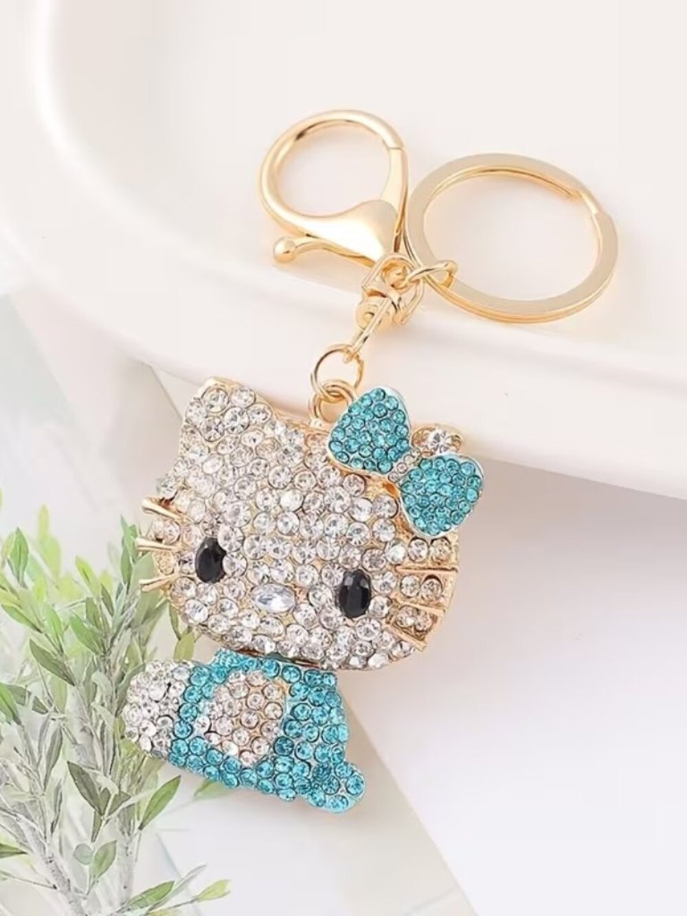 kat with blue dress and bow bag charm keychain
